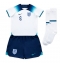 Strój piłkarski Anglia John Stones #5 Koszulka Podstawowej dziecięce MŚ 2022 Krótki Rękaw (+ Krótkie spodenki)