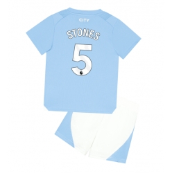 Strój piłkarski Manchester City John Stones #5 Koszulka Podstawowej dziecięce 2023-24 Krótki Rękaw (+ Krótkie spodenki)