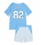 Strój piłkarski Manchester City Rico Lewis #82 Koszulka Podstawowej dziecięce 2026-27 Krótki Rękaw (+ Krótkie spodenki)
