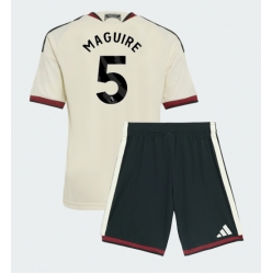 Strój piłkarski Manchester United Harry Maguire #5 Koszulka Trzeciej dziecięce 2026-27 Krótki Rękaw (+ Krótkie spodenki)
