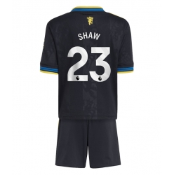 Strój piłkarski Manchester United Luke Shaw #23 Koszulka Trzeciej dziecięce 2025-26 Krótki Rękaw (+ Krótkie spodenki)