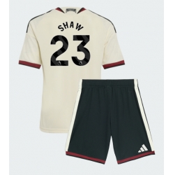 Strój piłkarski Manchester United Luke Shaw #23 Koszulka Trzeciej dziecięce 2026-27 Krótki Rękaw (+ Krótkie spodenki)